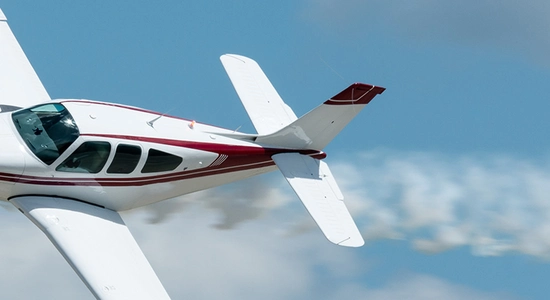 side angle of an airplane while flying.