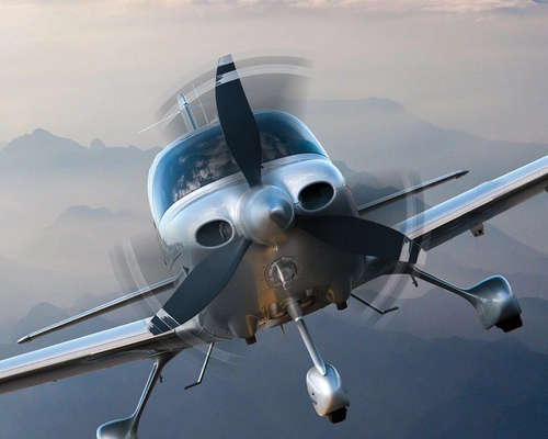 The front of an airplane while flying.