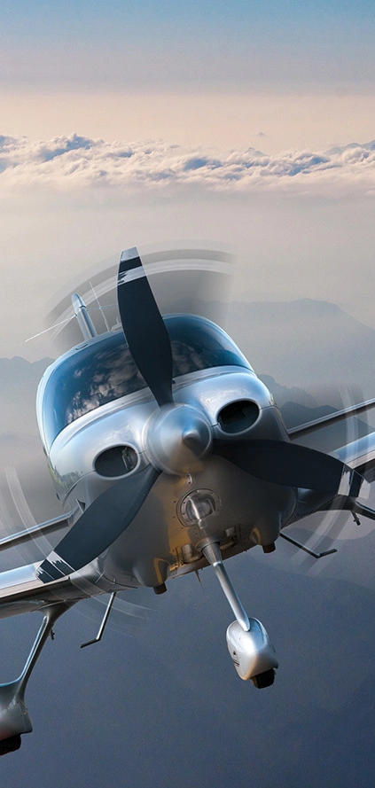 close up of the front of a plane while flying.